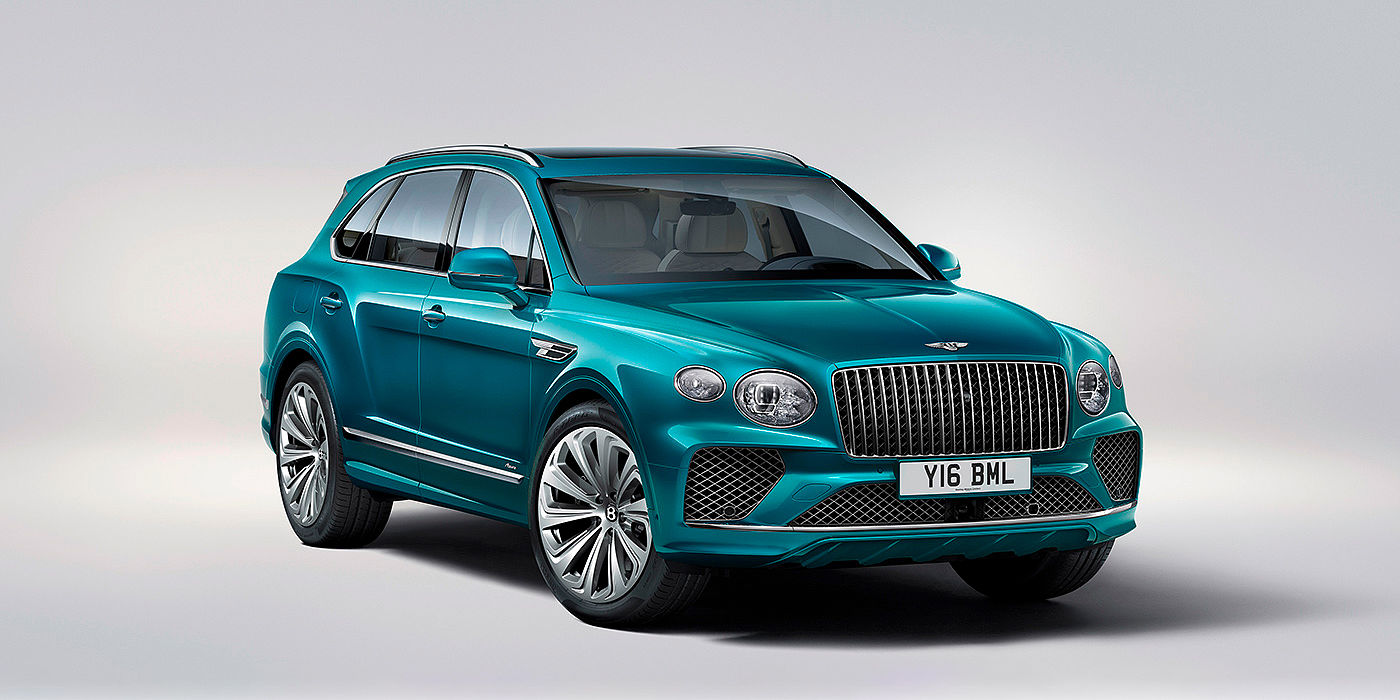 Bentley Suzhou Bentley Bentayga Azure front three-quarter view, featuring a fluted chrome grille with a matrix lower grille and chrome accents in Topaz blue paint.
