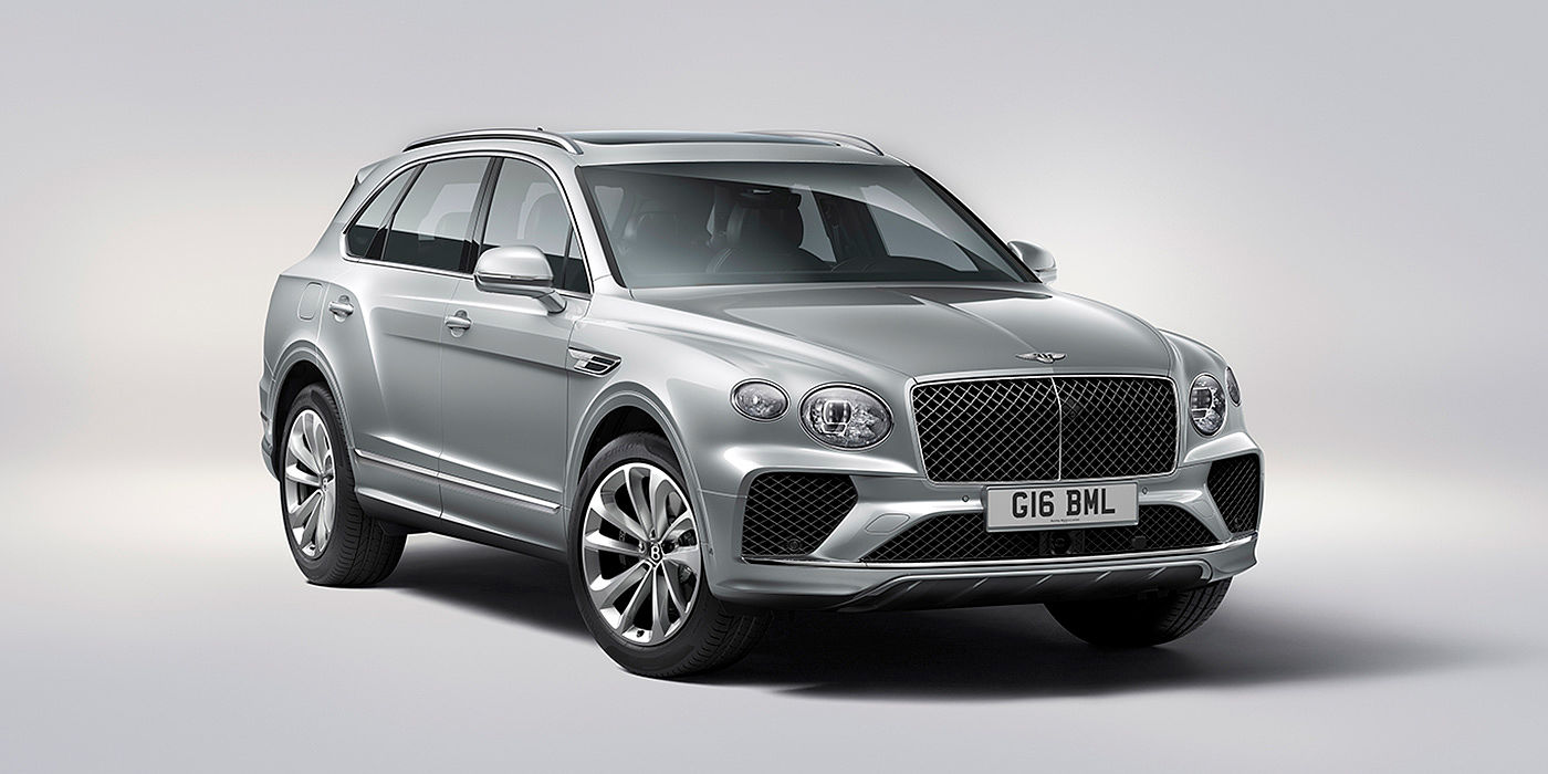 Bentley Suzhou Bentley Bentayga in Moonbeam paint, front three-quarter view, featuring a matrix grille and elliptical LED headlights.
