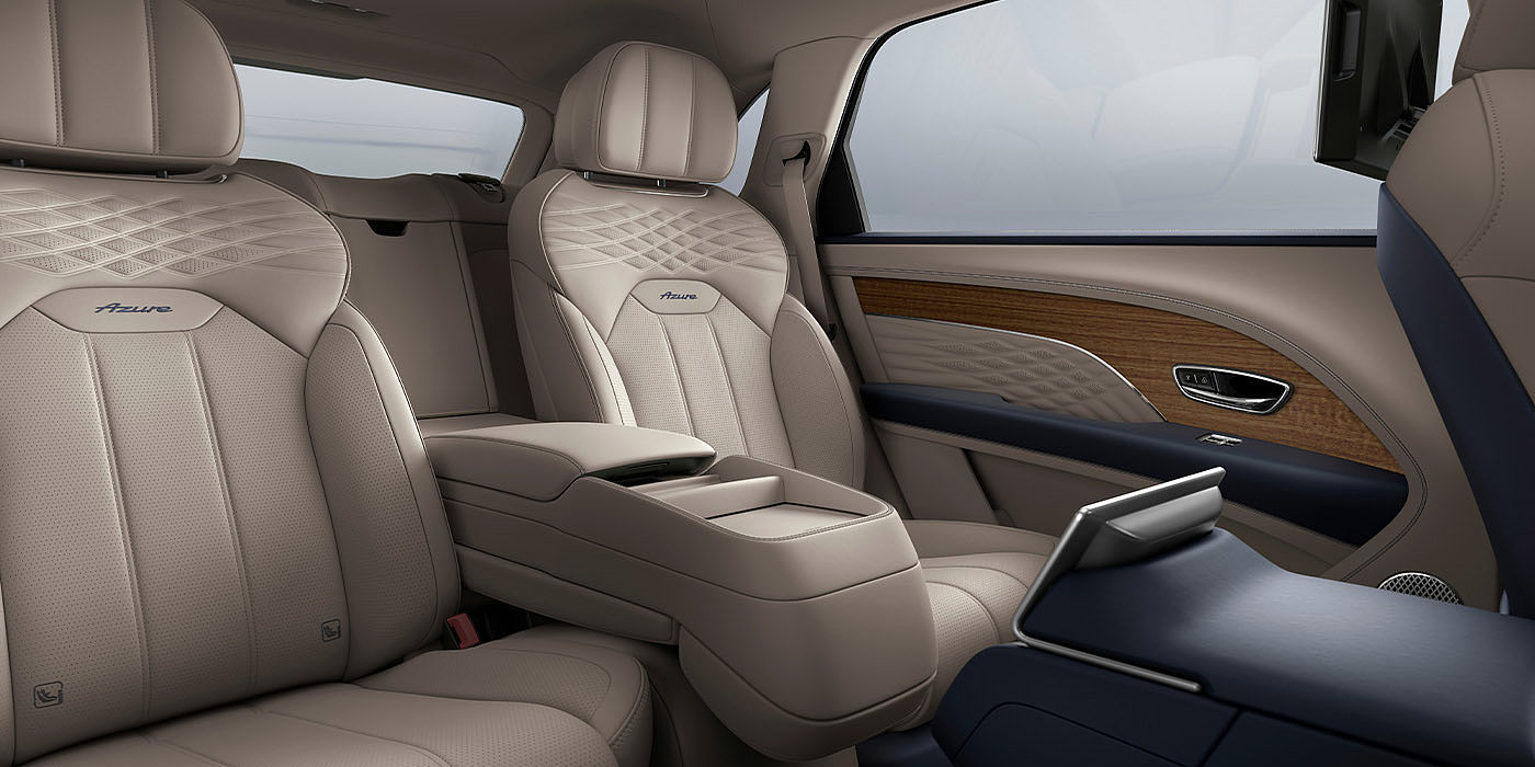 Bentley Suzhou Bentley Bentayga EWB Azure interior view for rear passengers with Portland hide featuring Azure Emblem in Imperial Blue contrast stitch.