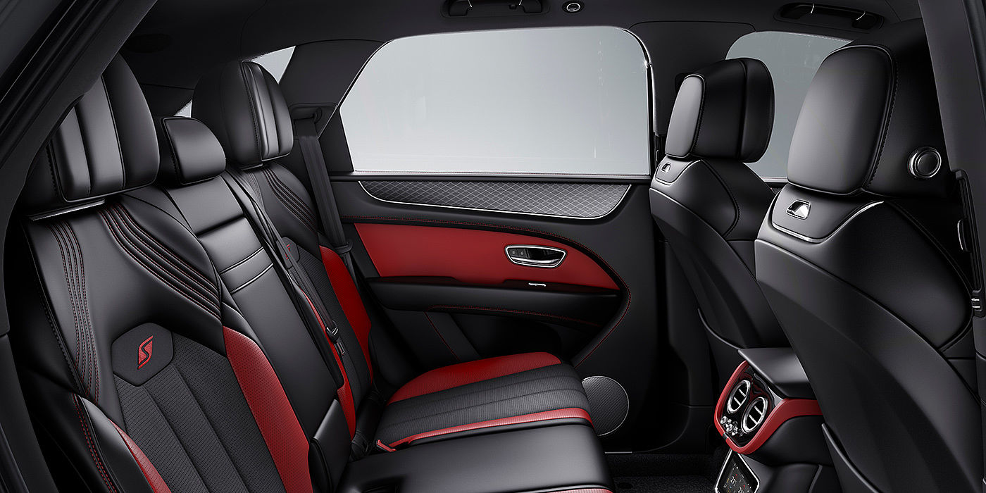 Bentley Suzhou Bentey Bentayga S interior view for rear passengers with Beluga black and Hotspur red coloured hide.